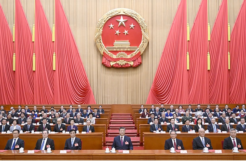 十四届全国人大三次会议在京闭幕 习近平等在主席台就座