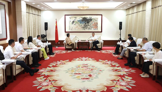 郑建邦会见中国民族贸易促进会一行